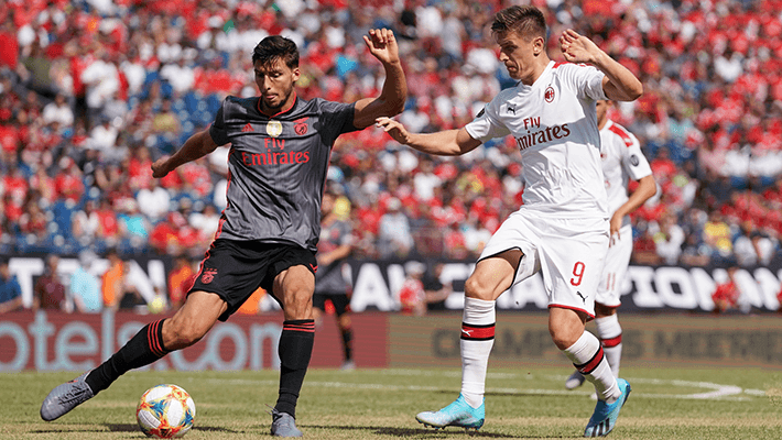 BENFICA CLAIM NARROW WIN IN FOXBOROUGH